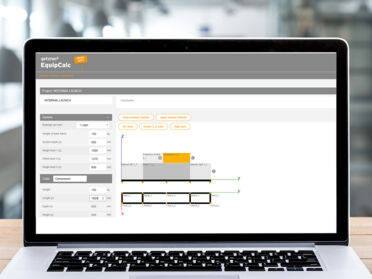 Laptop on a wooden table displaying Getzner EquipCalc planning software for vibration isolation. Laptop on a wooden table displaying Getzner EquipCalc planning software for vibration isolation.